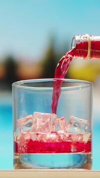Vermouth Negroni, spanish wine drink, Alcoholic Americano Cocktail bitter, sweet vermouth and soda water, close up of making drink, summer spanish vacations. 