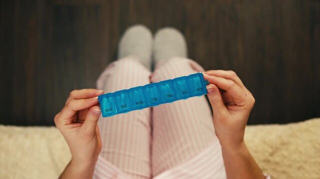 Pills and vitamins macro, Close up view of womans hands holding plenty of different drugs. Painkillers and antibiotics. Healthcare and medicine concept