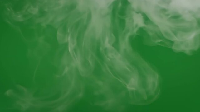 Flickering Flames and Rising Smoke Against Green Background