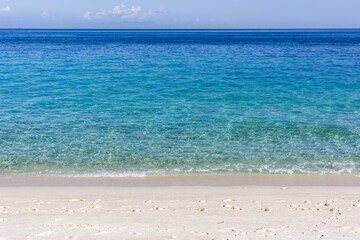 Fototapeta premium Koh Adang beach with turquoise water and white sand. Tropical island in Tarutao National Park, Thailand. Clear blue ocean and serene coastal scene.