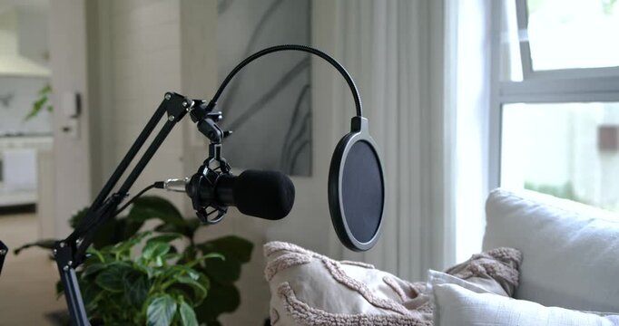 Microphone assembly is shifting and settling after off-screen adjustment to align mic for recording