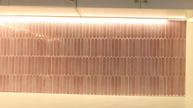 Stylish kitchen with countertop, peel and stick tiles, camera moving in. Interior design