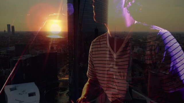 Musician playing guitar, turning to mic as sun dipping, overlaying skyline with purple flares