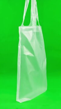 Dynamic Packaging Mockup with plastic bag rotating on green screen background distortion, overlay, glitch, static noise, scan lines black background, 4k animated video loop