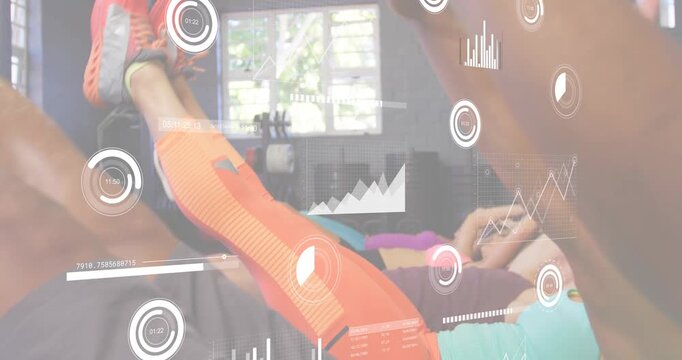 Five adults on mats performing synchronized V-sit crunches, timers overlaying fitness HUD tracking