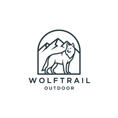 Obraz premium Wolf Trail Outdoor Logo Design Featuring a Wolf and Mountains.