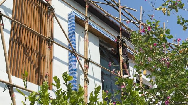 Working at heights, The workers are repairing the house, painted
