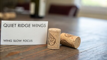 Elegant Corks with Rustic Wood Background at Quiet Ridge Wings Winery Setting