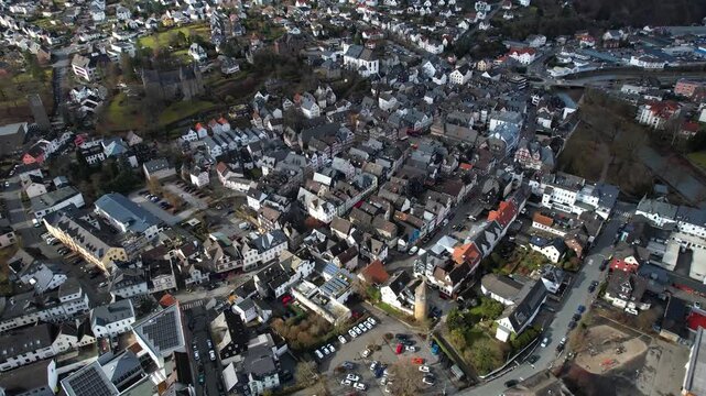 Aerial view around the old town of the city Herborn in Germany on a sunny late winter day
