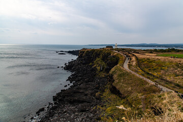 tranquil seascape at the seaside of Seopjikoji in Jeju Island, on overcast day