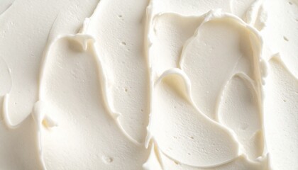 Luxurious close-up of a white, creamy texture, ideal for desserts, sweet treats, and culinary creations, highlighting its rich, smooth consistency and inviting peaks