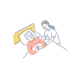 Fototapeta premium ベッドに寝ているシニア男性と介護している女性