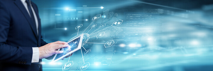 Businessman analysing distribution data and global supply chain network on tablet device, logistics...