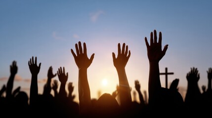 Silhouettes of people raising hands in worship at sunset with cross in background. Christian prayer gathering outdoors. Faith, spirituality, praise and devotion during church service