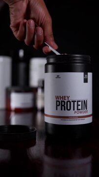 Athlete preparing a whey based drink for muscle recovery