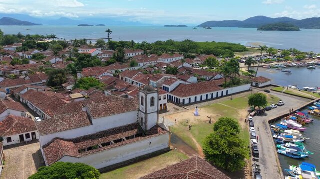 Paraty Historic Center colonial buildings and Igreja Matriz de Nossa Senhora dos Rem&eacute;dios facing Ba&iacute;a de Paraty marina and Atlantic coastline within Costa Verde region Rio de Janeiro Brazil, aerial
