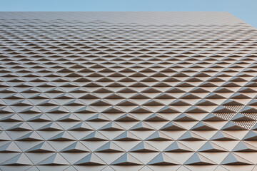 Modern building exterior architecture under blue sky, no people