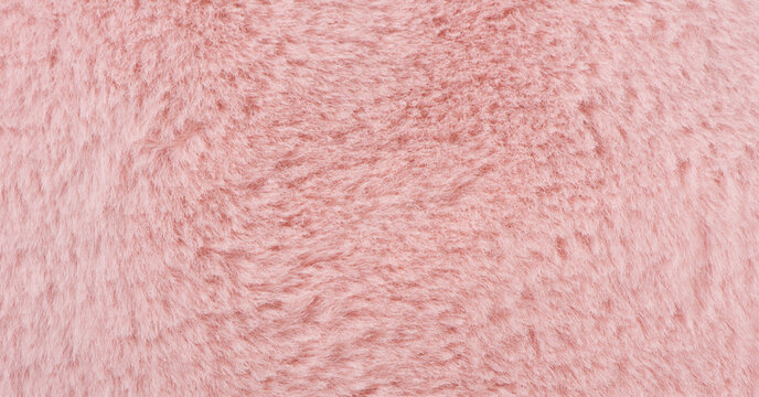 pink plush fabric texture background, background of soft warm material