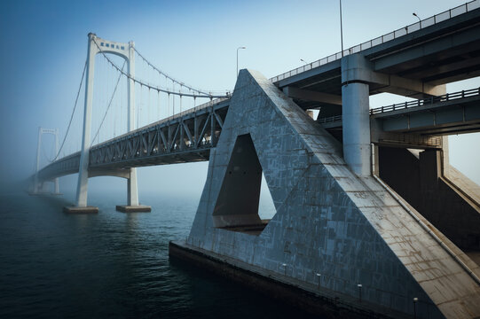 High-Definition Aerial View of Xinghai Bay Bridge in Dalian Covered by Sea Fog
