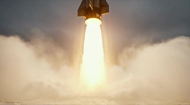 Submarine-launched ballistic missile (SLBM) emerging from ocean water with rocket engine ignition