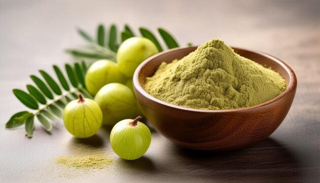 fresh gooseberry fruit and amla powder in a wooden bowl healthful ingredients for a nutritious diet