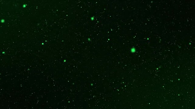 Abstract dark green background with glowing particles creating a dynamic visual