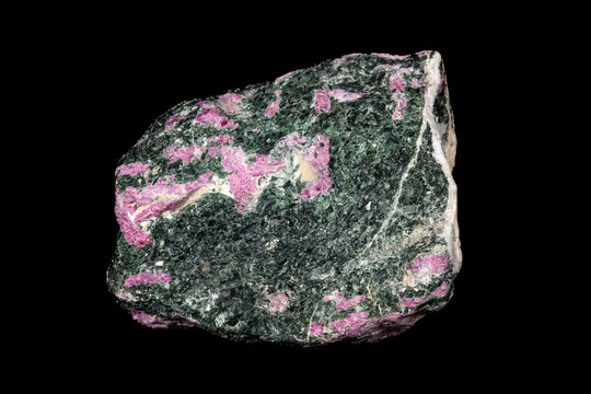 Sample of ruby zoisite from Tanzania. Also called Anyolite. Combination of red ruby crystals, green zoisite and dark green and black pargasite. 
