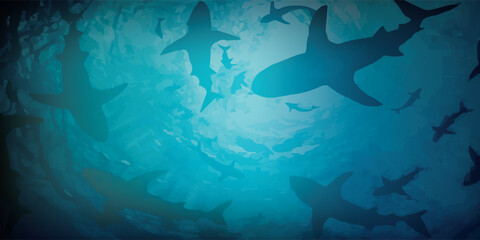Sharks swimming in deep blue ocean water a captivating underwater scene. © Sakina