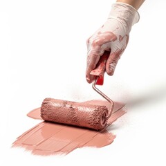 Person in white gloves applying pink paint with a roller on a white surface isolated on white background