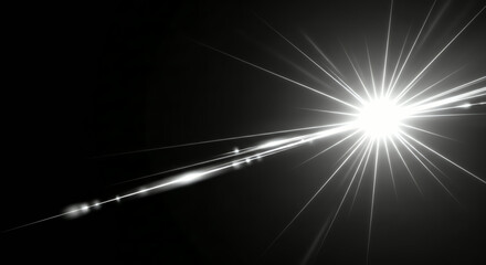 Fototapeta premium Bright Starburst Lens Flare Effect on Black Background