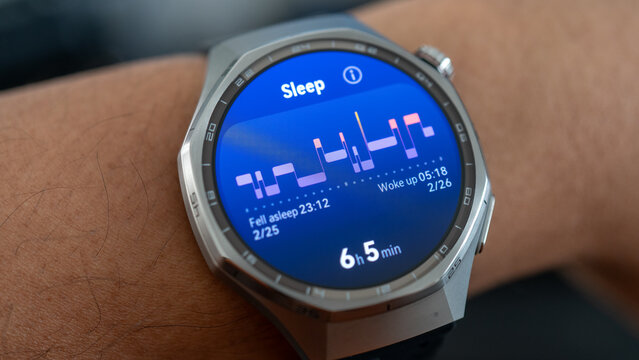 Smartwatch Displaying Sleep Cycle Graph and Nightly Rest Analytics