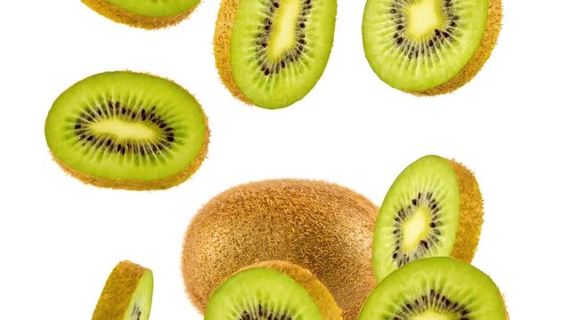 Fresh Kiwi Fruit Slices Falling Through Air.