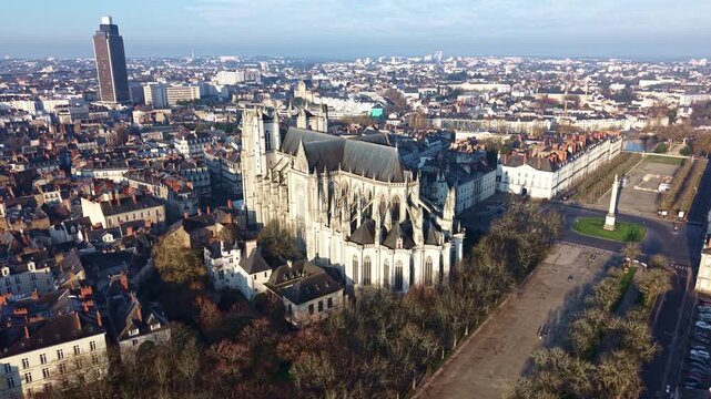 Wide aerial view of Nantes cityscape, Cathedral of Saint Pierre or St Peter and Saint Paul, Place Mar&eacute;chal Foch, and Tour de Bretagne in background, France