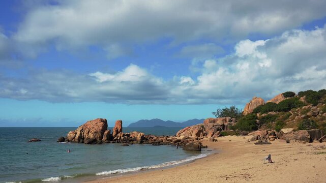 Horseshoe Bay Bowen Australia nature landscape swimming diving Airlie Proserpine beach sunny blue sky clouds Coral Sea Marina rock boulders Harbor View Great Barrier Reef coral fish Whitsunday Region