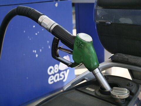 Q8 petrol pump station sign in the commercial center.  