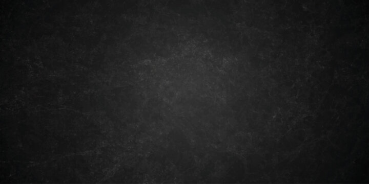 Dark charcoal grunge wall texture background. Dark black rough grunge surface with smoke edge. Black texture chalk board and black board.