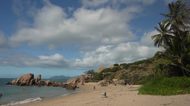 Horseshoe Bay Bowen Australia nature landscape swimming diving Airlie Proserpine beach sunny blue sky clouds Coral Sea Marina rock boulders Harbor View Great Barrier Reef corals relaxing peaceful