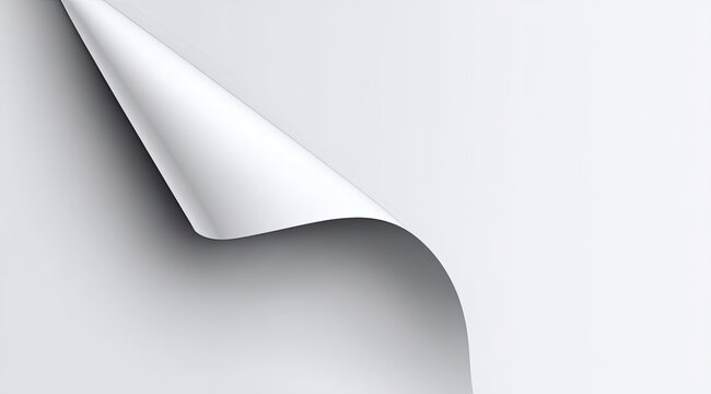 A white paper page with a curved corner peeled back, casting a soft shadow
