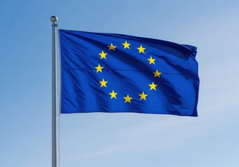 Waving textile banner displaying a circle of twelve stars against a clear bright sky