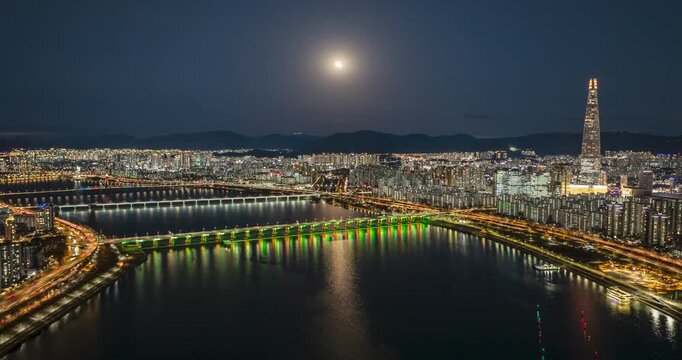 Hyperlapse of Total Lunar Eclipse Blood Moon over Lotte World Tower and Seoul Cityscape