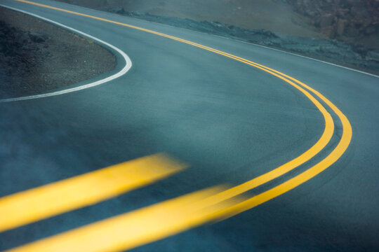 Distorted Double Yellow Lines of Highway Reflected in Side Mirror, Hawaii Volcanoes National Park, Big Island, Hawaii