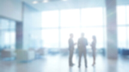 Fototapeta premium Blurred Business People in Modern Office Lobby Background