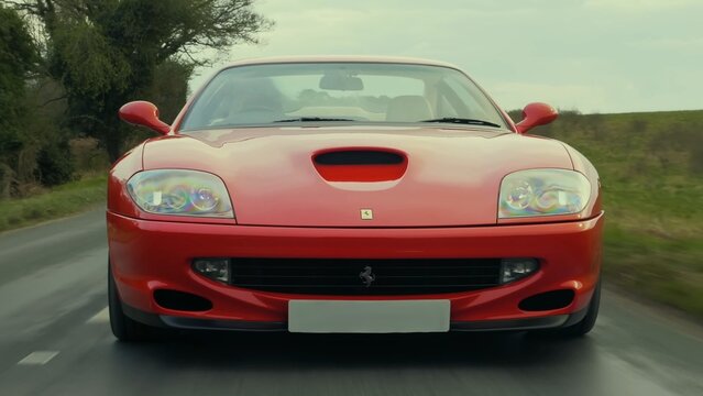 Ferrari 550 Maranello, red sports car.