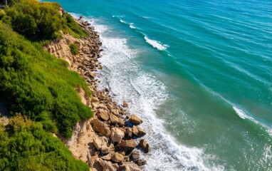 Aerial View of Rugged Coastal Cliffs and Shoreline during Summer Days