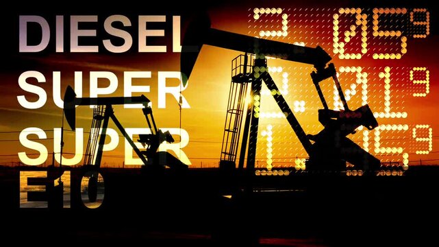 Ein &Ouml;lfeld mit Bohrt&uuml;rmen und Preistafel an einer Tankstelle, die hohe Kraftstoffpreise anzeigt 