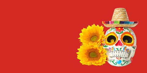 Fototapeta premium Colorful skull with a sombrero and yellow sunflowers displayed
