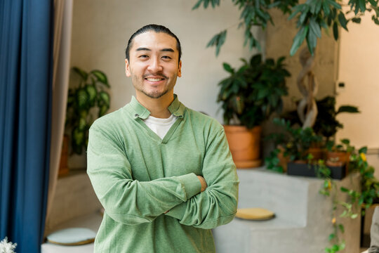 Smiling person receiving lunch delivery in modern office interior