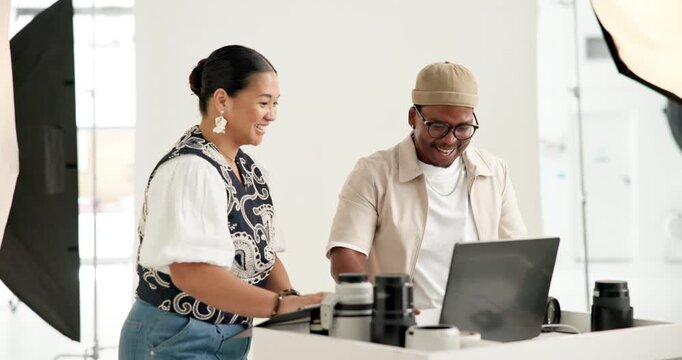 Photographer, people and high five in studio with laptop, campaign success or production achievement. Photography bts, team and celebration on set with tech, creative collaboration or accomplishment.