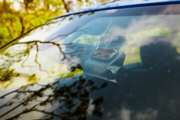 Dashcam attached to the windshield of the car
