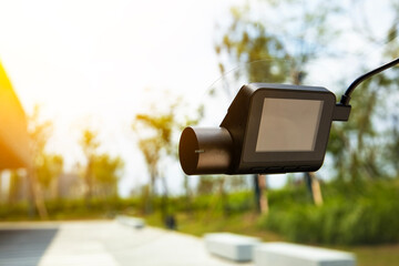 Dashcam attached to the windshield of the car